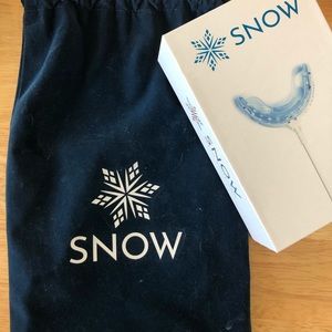Never used brand new Snow at home teeth whitening kit (all-in-one)